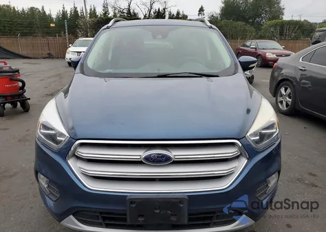 2018 Ford Escape Titanium z USA, uszkodzony, nr VIN 1FMCU0J90JUC09727
